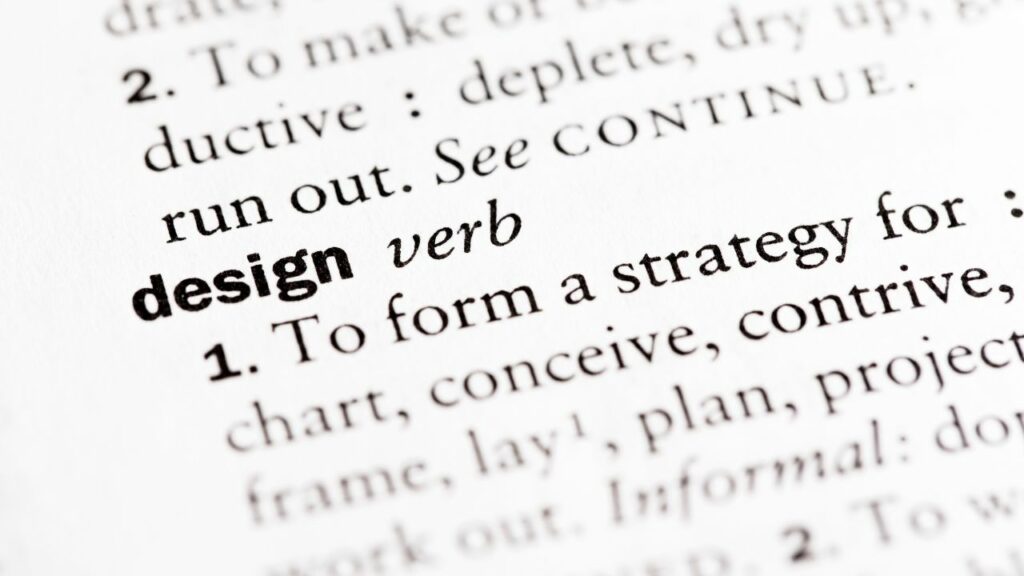 classes gramaticais em inglês - pagina de um dicionário com a palavra design e verb destacada.